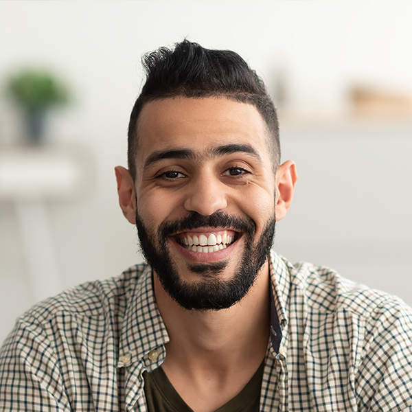 Home 14 portrait of handsome young arab man smiling and lo XHBVC4Z