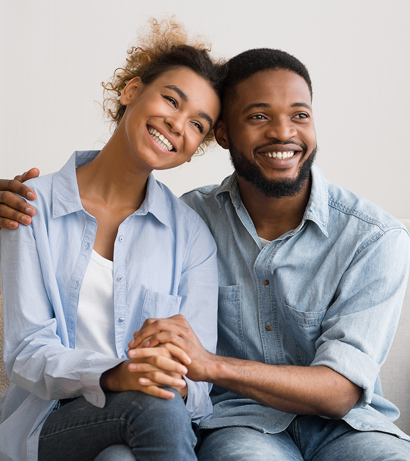Home 12 positive african american couple hugging after rec PFLEMJZ